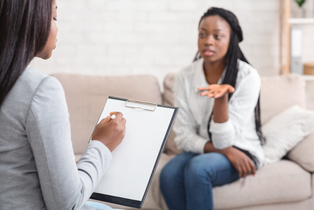 woman speaking with a doctor about Medication assisted treatment at Maplewood, NJ