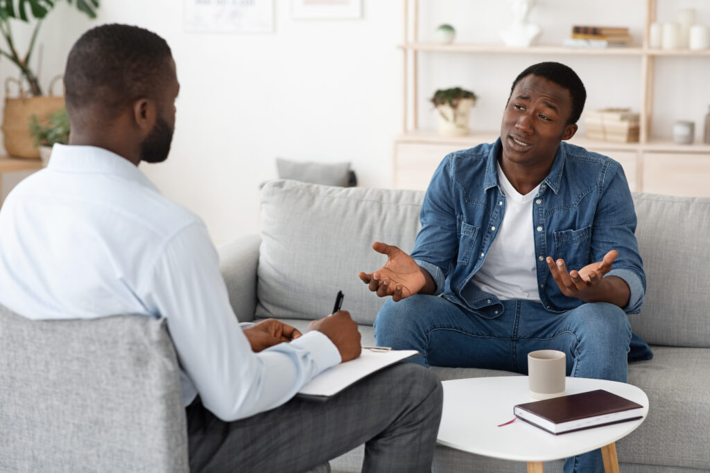 a doctor and black man meeting for medication assisted treatment in Maplewood NJ